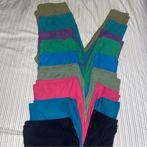 9 solid LuLaRoe leggings and 1 Green print LuLaRoe legging.